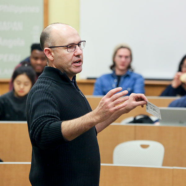 Professor Andy Molinsky speaks to a classroom of students.