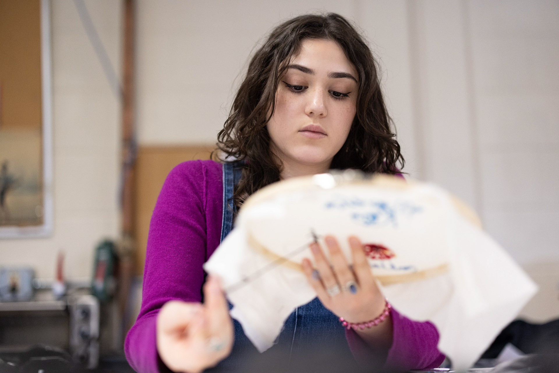 A student sews